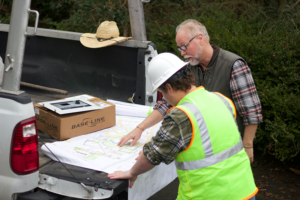 Tom Campbell of Water Scout working with a contractor